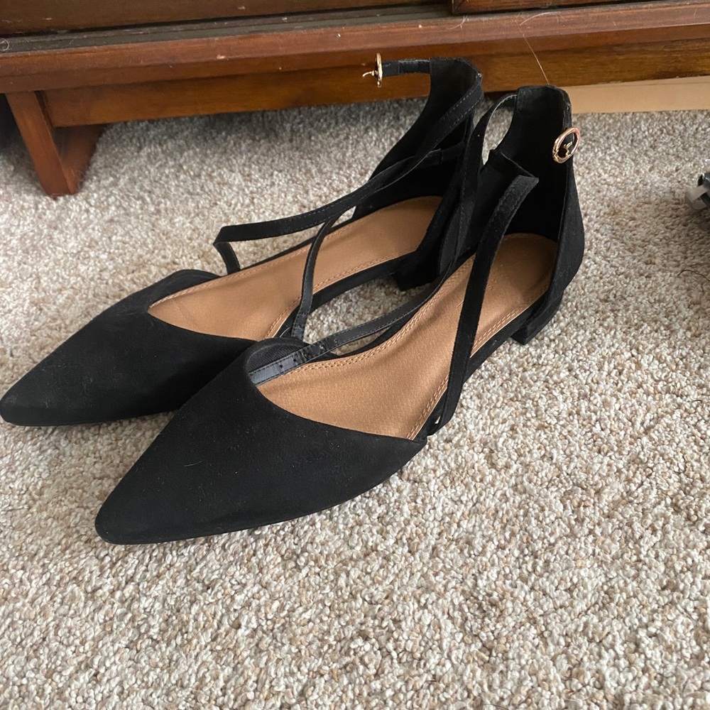 Black flats with wrap detailing